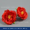 Tea rose blossoms, bright red