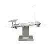 Mesa de operaciones basculante y elevable en forma de T