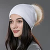 White with beige pom