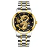 Black dial, gold bezel, gold bracelet