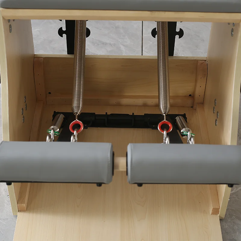Stable Wooden Pilates Pro Chair Spring Reformer Sports Studio and Home Wunda Pilates Chair