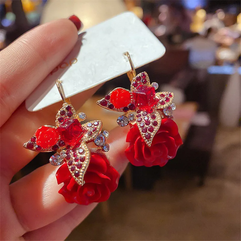 Buy Gold-Toned & Red Earrings for Women by Yellow Chimes Online | Ajio.com
