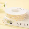 Cinta de gasa blanca nieve con estampado dorado - estrella, 2.5cm x 10 yardas