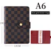 Raccoglitore A6 marrone + rosso + oro rosa