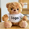 T-shirt bianca con orso bruno
