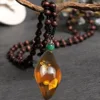Collar de ámbar fósil con cuentas de madera - forma de diamante