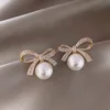2 Pearl Bow ear pin C2016
