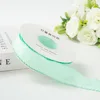 38mm aqua dot wavy edge [10 yards]