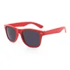 Lente: negro + montura: roja