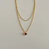 XL166 gold red zircon