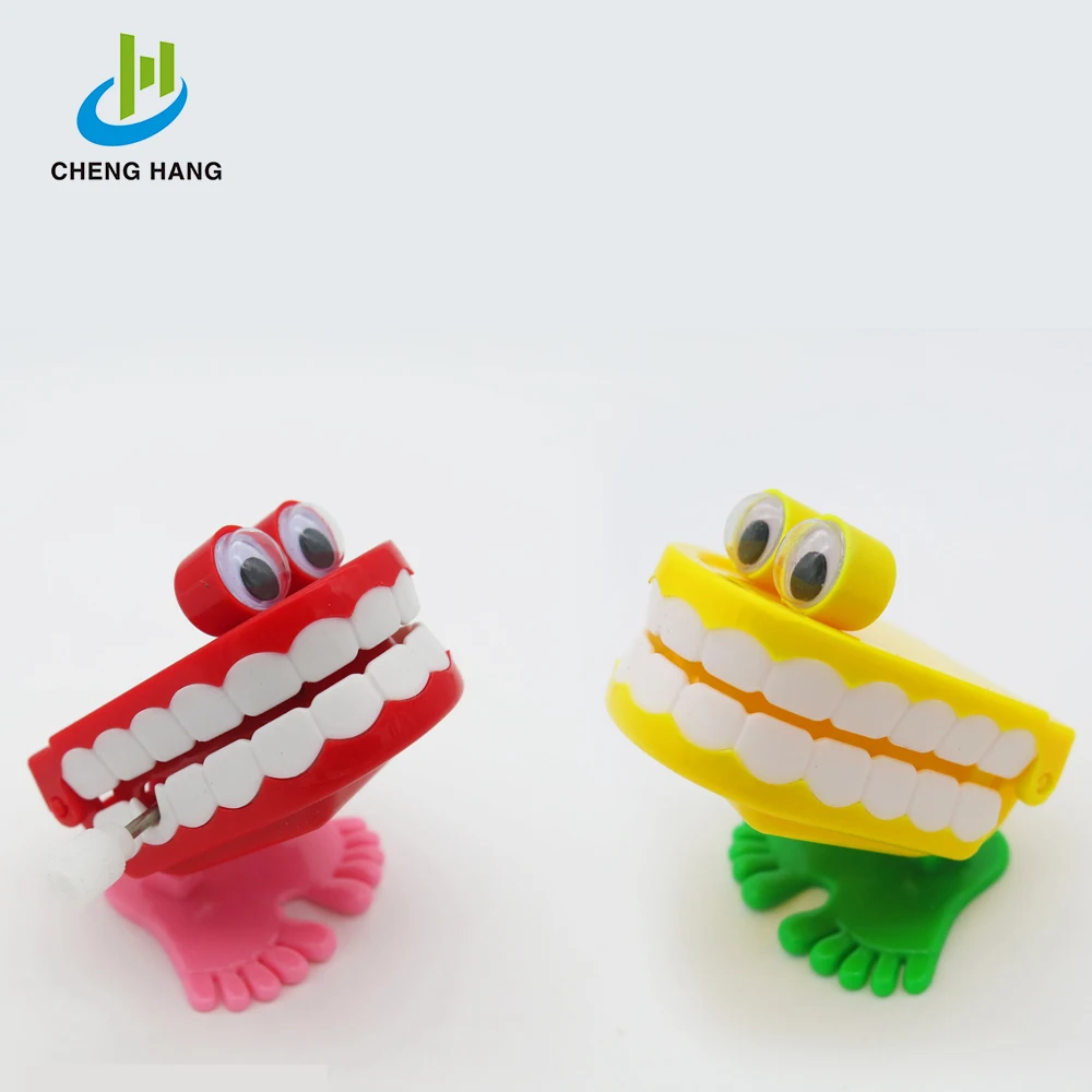 Kids Funny Wind Up Toys Clockwork Jumping Teeth For Halloween Gift