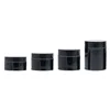 Black jar with black plastic cover