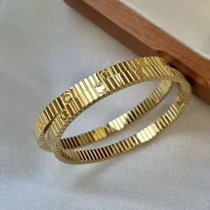 Designer Brand Women's Stainless Steel Striped 18K Gold Plated Single Letter Bracelet, Waterproof and Fade-resistant.