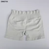 pluma corta beige