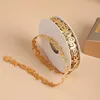 Oro 1,3 cm 10 yardas