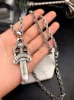A large sword with alphabet chain