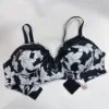 Black background with white floral print