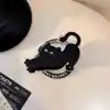 Stretching black cat