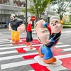 Escultura de personaje de dibujos animados