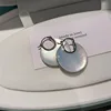 conchiglia bianca bifacciale grande argento 3 cm