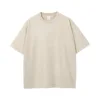 T-shirt color albicocca con stampa a cera