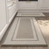 Gold-woven kitchen mat - with banded border