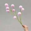 Pompon rose à neuf têtes