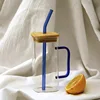 Azul del mar profundo, paja azul, tapa de la taza
