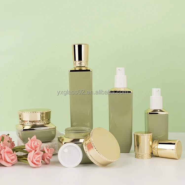 Cosmetic glass bottle set recyclable skincare cosmetic packaging glass container with Luxury pump spray cap supplier