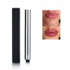 Voluminizador de labios extremo en tubo plateado brillante