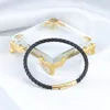 Chiusura oro + vero sheepski nero