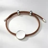 Cordoncino marrone+ciondolo argento