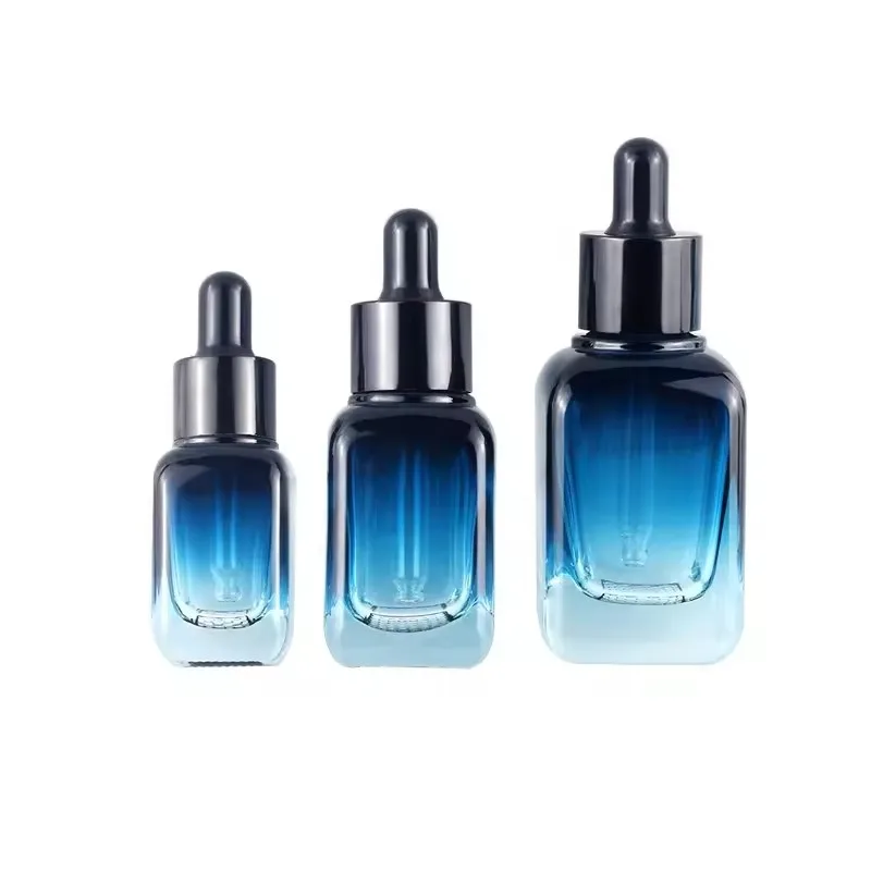 Custom square grid bottom blue gradient cosmetic glass bottles essential oil glass bottle serum packaging glass dropper bottle