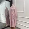 Pink cardigan + inside + hijab