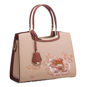 Stylish embroidered PU leather women's tote with floral embellishments Mom's slant shoulder bag with pendant