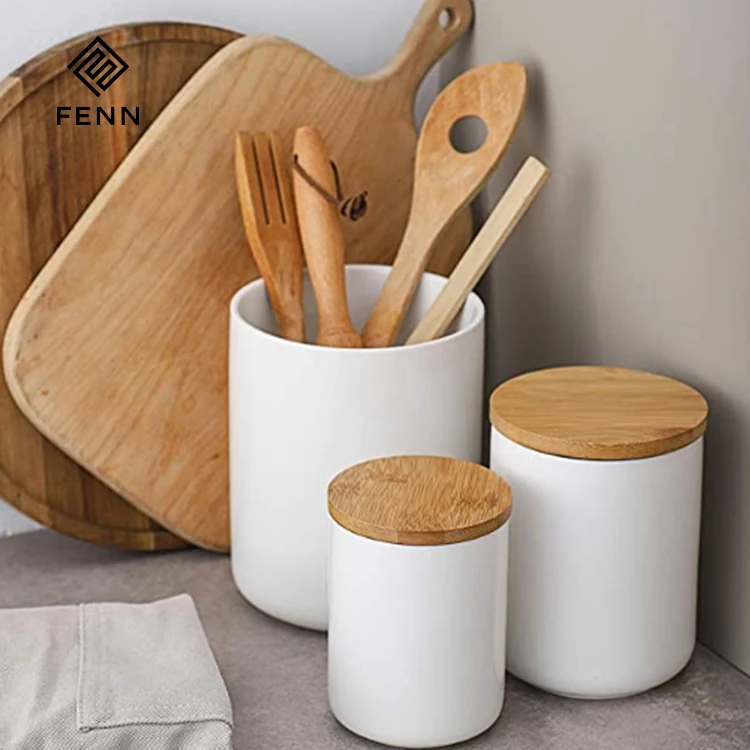 Practical customizable white black kitchenware ceramic storage jar with a wooden lid for home uses