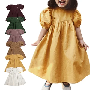 Wholesale Baby Girl Party Dress Lantern Shorts Sleeve Boutique Frock Fall Yellow Kids Plain Princess Smocked Dresses