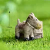 The little donkey pulls the mill