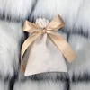 Beige Bag with Gold Ribbon