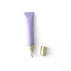 Tubo viola satinato da 20 g + testina massaggiante in ceramica dorata