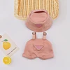21. Pink bucket hat + overalls (without doll)