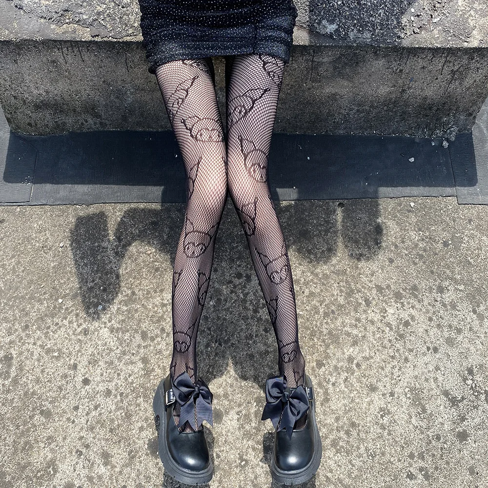 Designer fishnet tights best sale