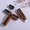 Amber bottle body + black plastic cap + transparent glass beads