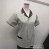 ชุดสูทแขนสั้นสีเขียวอ่อน