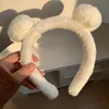 Doppie palline in pelliccia di coniglio bianco