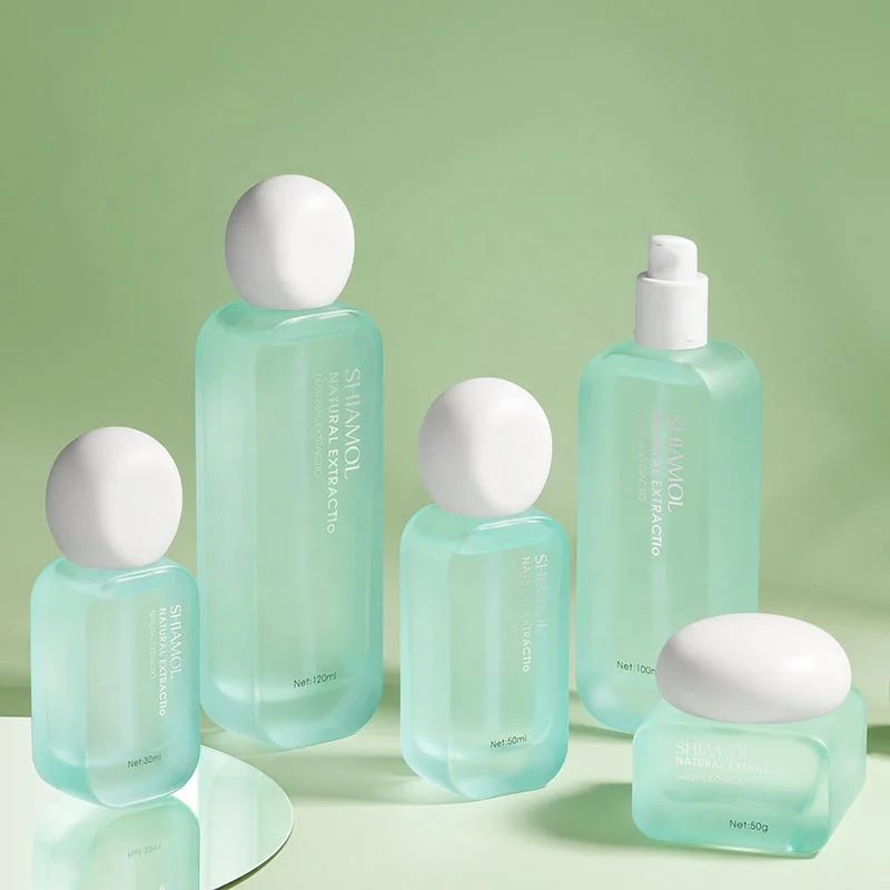 New Design 30ml 50ml 100ml 120ml Custom Cosmetics Skincare Packaging Set 30g 50g Green Glass Face Cream Container with Lids