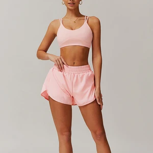 Custom Naked Sensation Quick Dry Yoga Set Crisscross Thin Strap Pocket Shorts 2 Piece Outfit Butt Lifting Gym Yoga Set for Women