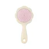 Yellow flower cushion brush