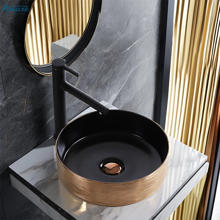 Vanity luxury gold and black color hotel washroom small round art washbasin ceramic table top bathroom sink hand wash basin