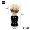 Spazzola per capelli neri con setole in nylon e finiture dorate